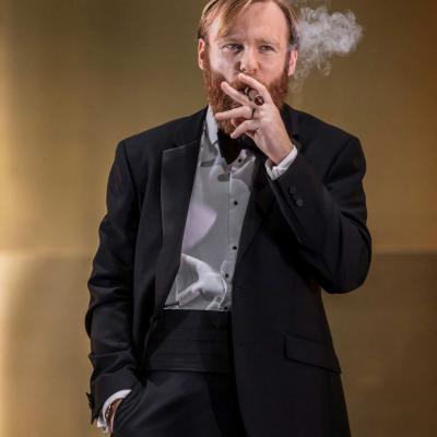 Brian Gleeson (Gooper) smokes a cigar in Cat on a Hot Tin Roof 